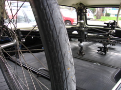 No problem!  Tandem is inside the car; fits with all doors and windows shut.  Bike is completely assembled with wheels, fenders, rear rack, pedals, seats, and handlebars.